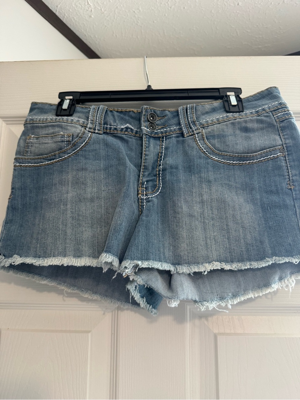 Red Rivet Light Wash Denim Cutoff Shorts with Frayed Hem